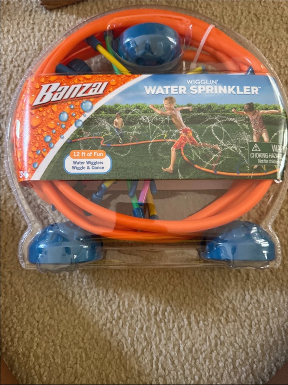 Banzai Wigglin' Water Sprinkler for Kids - Orange and Blue
